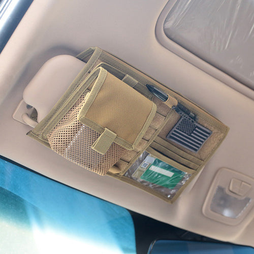 Sun visor organizer mounted on a car visor with flap pouch, mesh pocket, pen loop and clear card pocket (shown in tan)