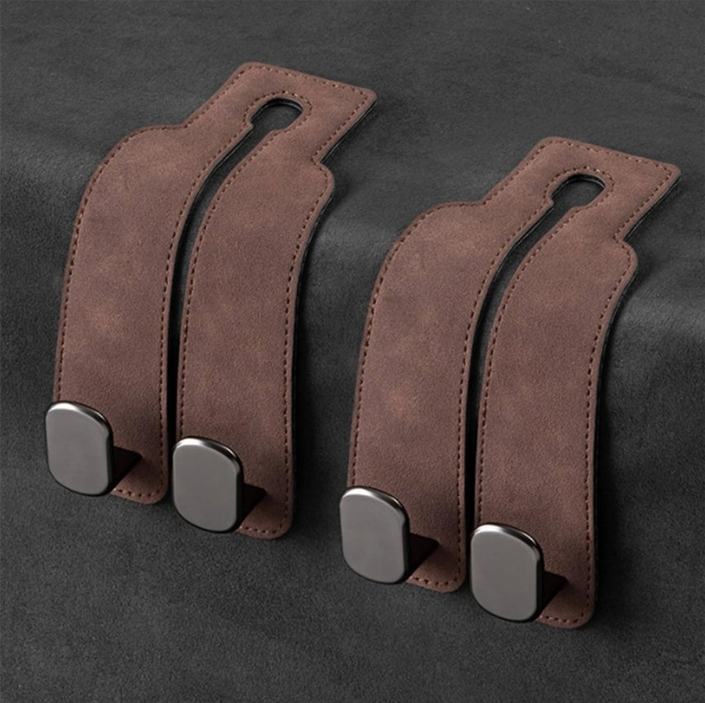 Two brown suede-look leather double-hook units laid flat side by side on dark fabric